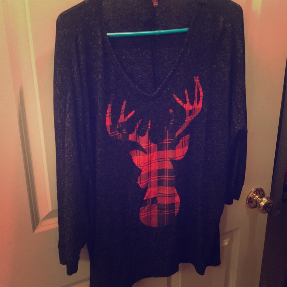 Size large buffalo print deer top.